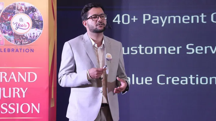 Bimal Raj Paudel speaking on stage at the ICT Award 2025